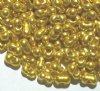 25 grams of 3x7mm Metallic Gold Farfalle Seed Beads